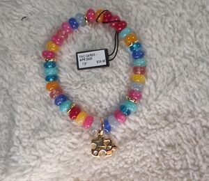 Vibrant Beaded Kids Bracelet with Gold Puzzle Charm